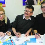 Février 2014 : Sarah Constantin, accompagnée de Luz et Charb, soutient le maire communiste Sébastien Jumel.